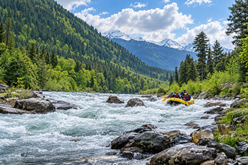 A rafting group on a mountain river; activity subject to the chosen plan