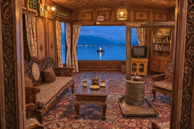 Carved-wood houseboat lounge overlooking the lake